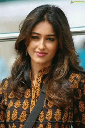 Woman with Long Hair in Black and Gold Dress