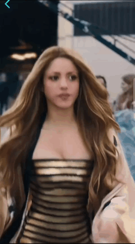 Woman with Long Hair in Black Gold Dress