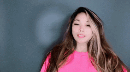Woman With Long Hair in Bright Pink Sweater