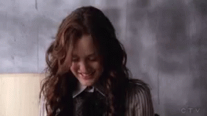 Woman With Long Hair Smiling and Laughing
