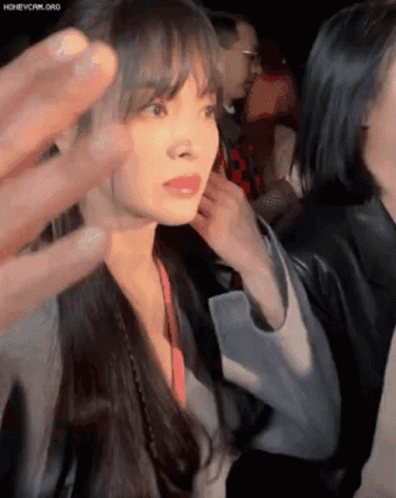 Woman With Long Hair Touched by Hand