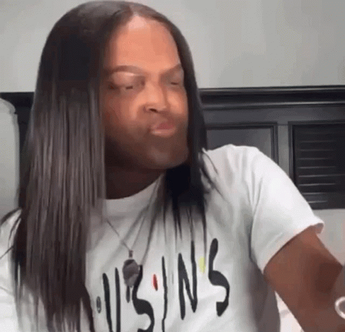 Woman With Long Hair Wearing Sins T-Shirt GIF