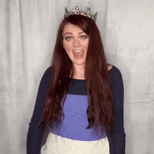 Woman With Long Red Hair and Tiara