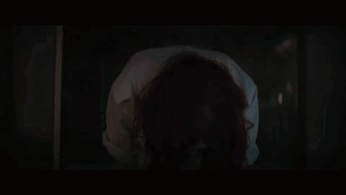 Woman with Long Red Hair Screaming