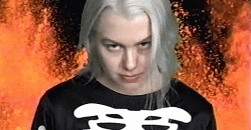 Woman With Long White Hair And Skeleton Shirt GIF