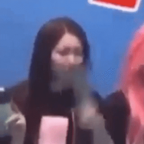 Woman With Mask At Microphone GIF