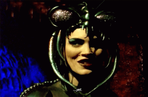 Woman With Mask on Head Smiling Says Yet
