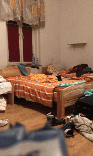 Woman With Messy Bedroom GIF