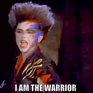 Woman With Mohawk and Painted Face Screaming
