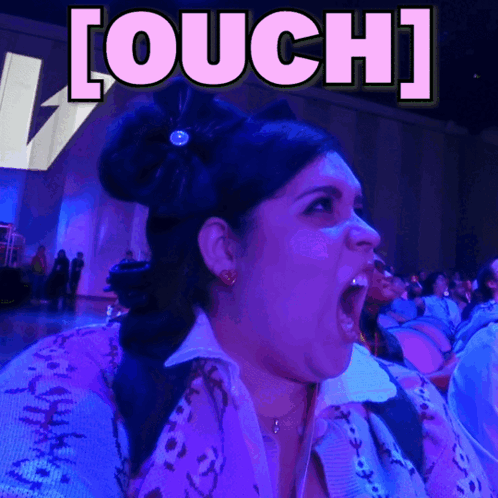Woman with Mouth Open Saying Ouch