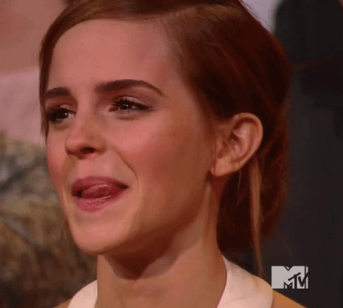 Woman with MTV Logo Behind Her