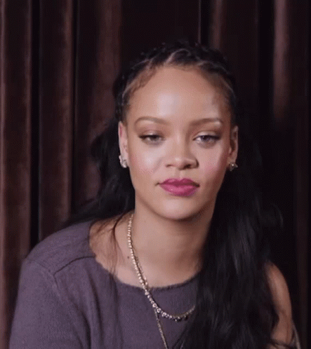 Woman With Necklace And Braided Hair GIF