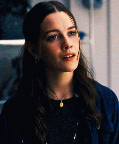 Woman With Necklace And Earrings GIF