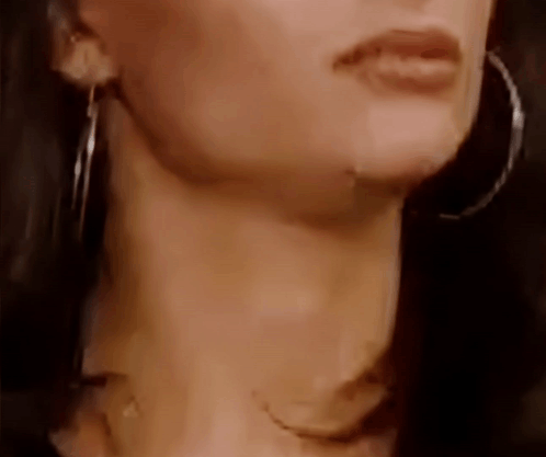 Woman with Necklace and Hoop Earrings