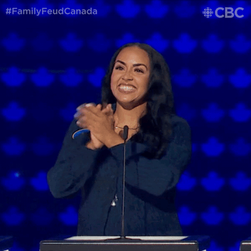 Woman With Nicole Name Tag at Microphone