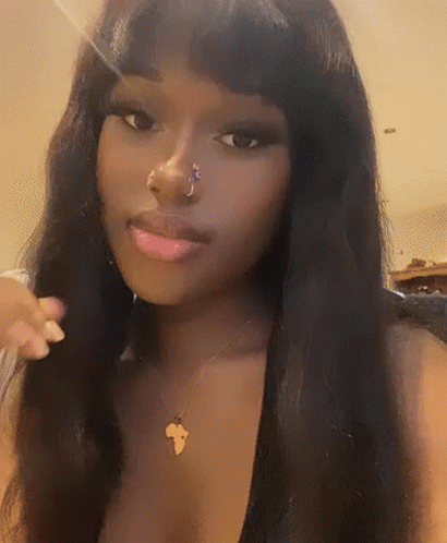 Woman With Nose Ring And Africa Map Necklace GIF