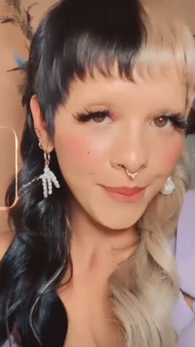 Woman With Nose Ring and Earrings