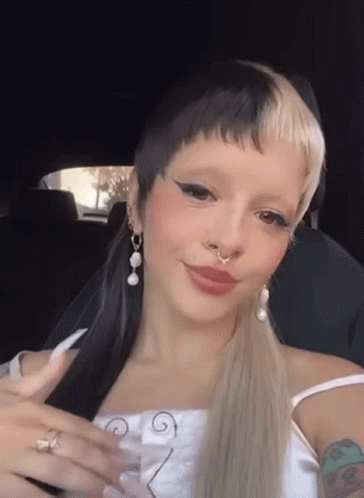 Woman with Nose Ring and Ponytail in Car