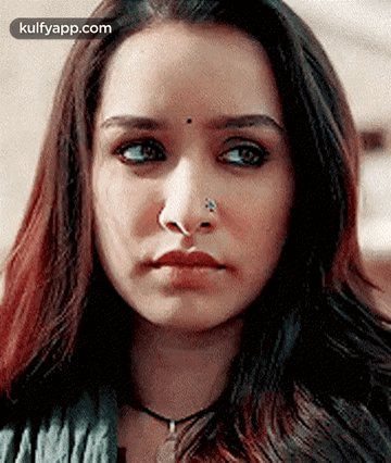 Woman With Nose Ring Looking at Camera