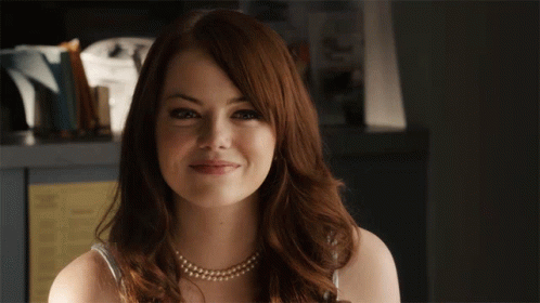Woman With Pearl Necklace Smiling GIF