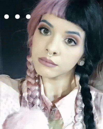 Woman With Pigtails and Nose Ring