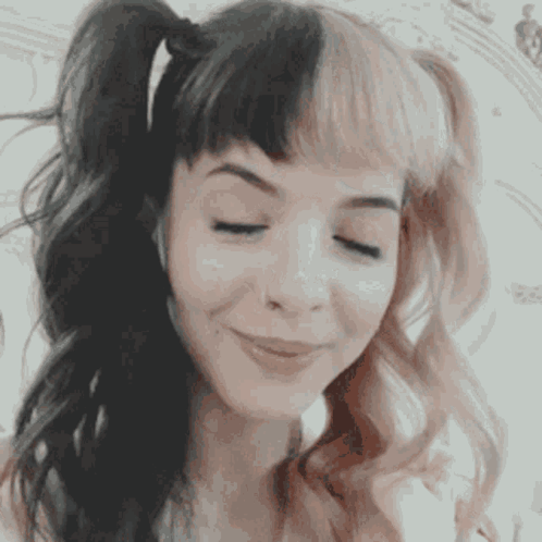 Woman With Pigtails Eyes Closed