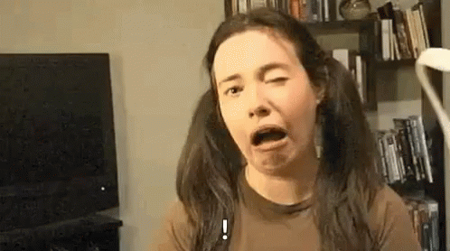 Woman with Pigtails Making Funny Face