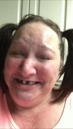 Woman With Pigtails Smiling GIF