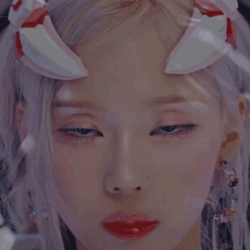 Woman with Pink and White Headpiece