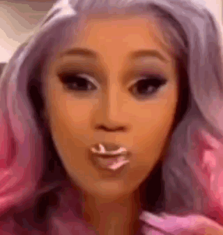 Woman With Pink Hair Blowing Kiss With Toothpick GIF