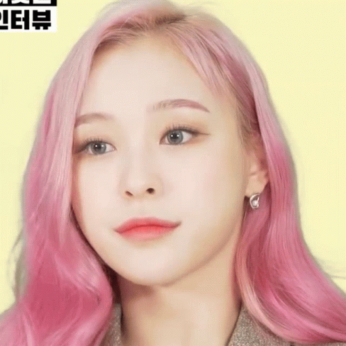 Woman With Pink Hair Close Up on Yellow Background