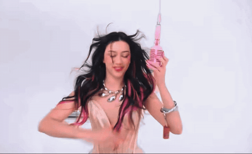 Woman With Pink Hair Holding Pink Microphone GIF
