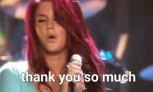 Woman with Pink Hair Singing Thank You