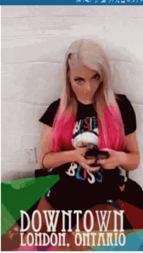 Woman with Pink Hair Sitting on Couch Downtown London Ontario