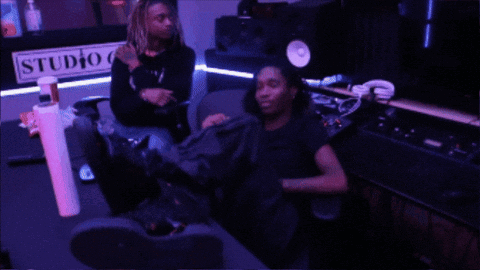 Woman With Pink Hair Wearing Headphones Says I Feel Amazing GIF