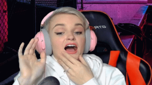 Woman with Pink Headphones on Chair with Ato