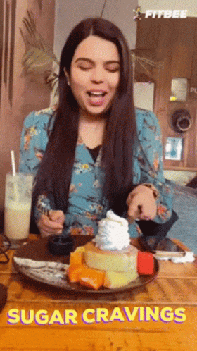 Woman with Plate of Food and Sugar Cravings