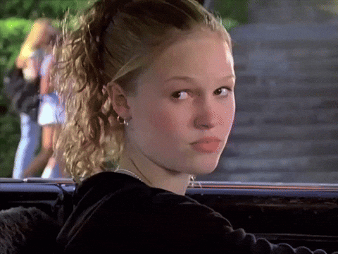Woman With Ponytail Sitting in Car