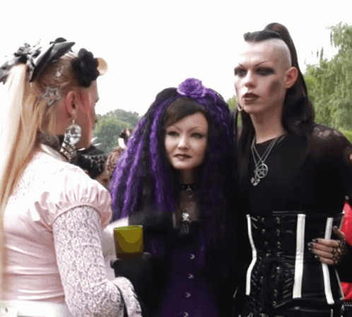 Woman with Purple Hair and Man with Mohawk