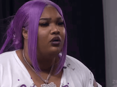 Woman With Purple Hair and White Shirt and Necklace