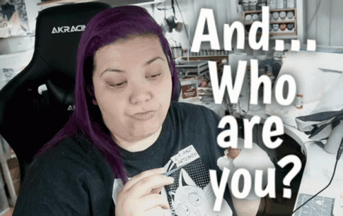 Woman With Purple Hair in AKRacing Chair Asking Who Are You