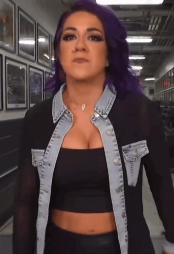 Woman With Purple Hair in Black Crop Top and Denim Jacket