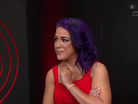 Woman With Purple Hair in Red Dress
