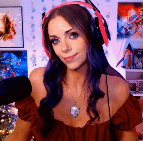 Woman With Purple Hair In Red Top And Headphones GIF