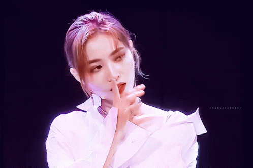 Woman With Purple Hair In White Collared Shirt GIF