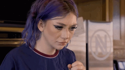 Woman With Purple Hair Looking at Something