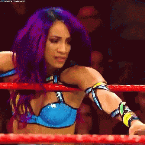 Woman With Purple Hair Standing In Ring GIF