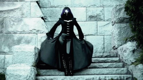 Woman With Purple Hair Standing on Steps