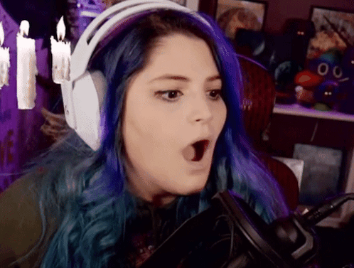 Woman with Purple Hair Surprised