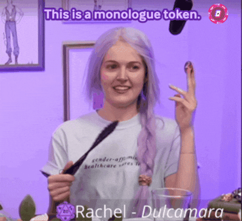 Woman with Purple Hair Wearing Healthcare Shirt
